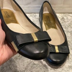 Brand New Michael Kors Black Leather Bow Flats with Gold Details